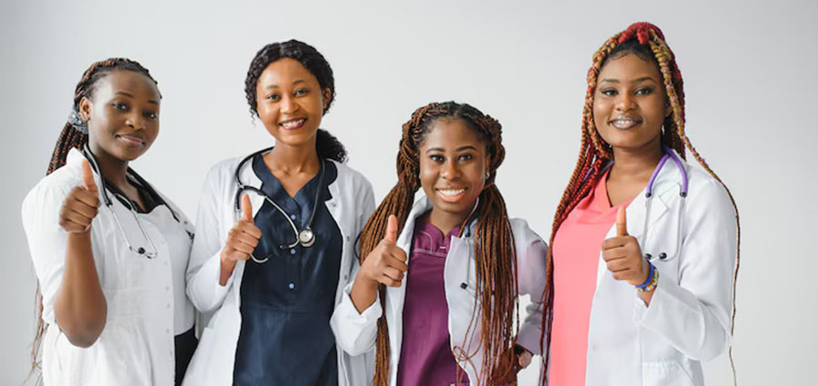 group-young-african-medical-students-hold-thumb-up-in-excitement.