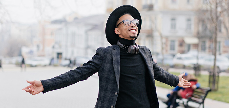 happy african living and working in germany enjoying outdoor.