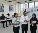 german-language-students-in-a-classroom-an-instructor-demonstrates-the-course-progression-on-a-whiteboard. How Long Does It Take to Learn German in Kenya.