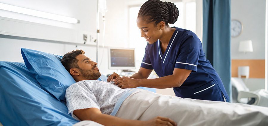 female-nurse-taking-care-of-a-patient-in-a-hospital-room. What is a Healthcare Assistant Course in Kenya.